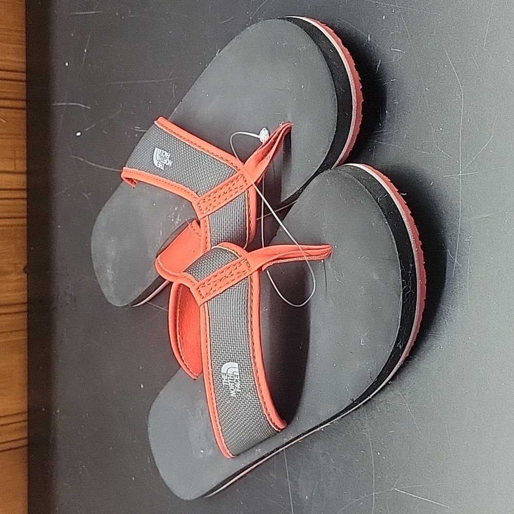 The North Face woman size 6 flip flop red